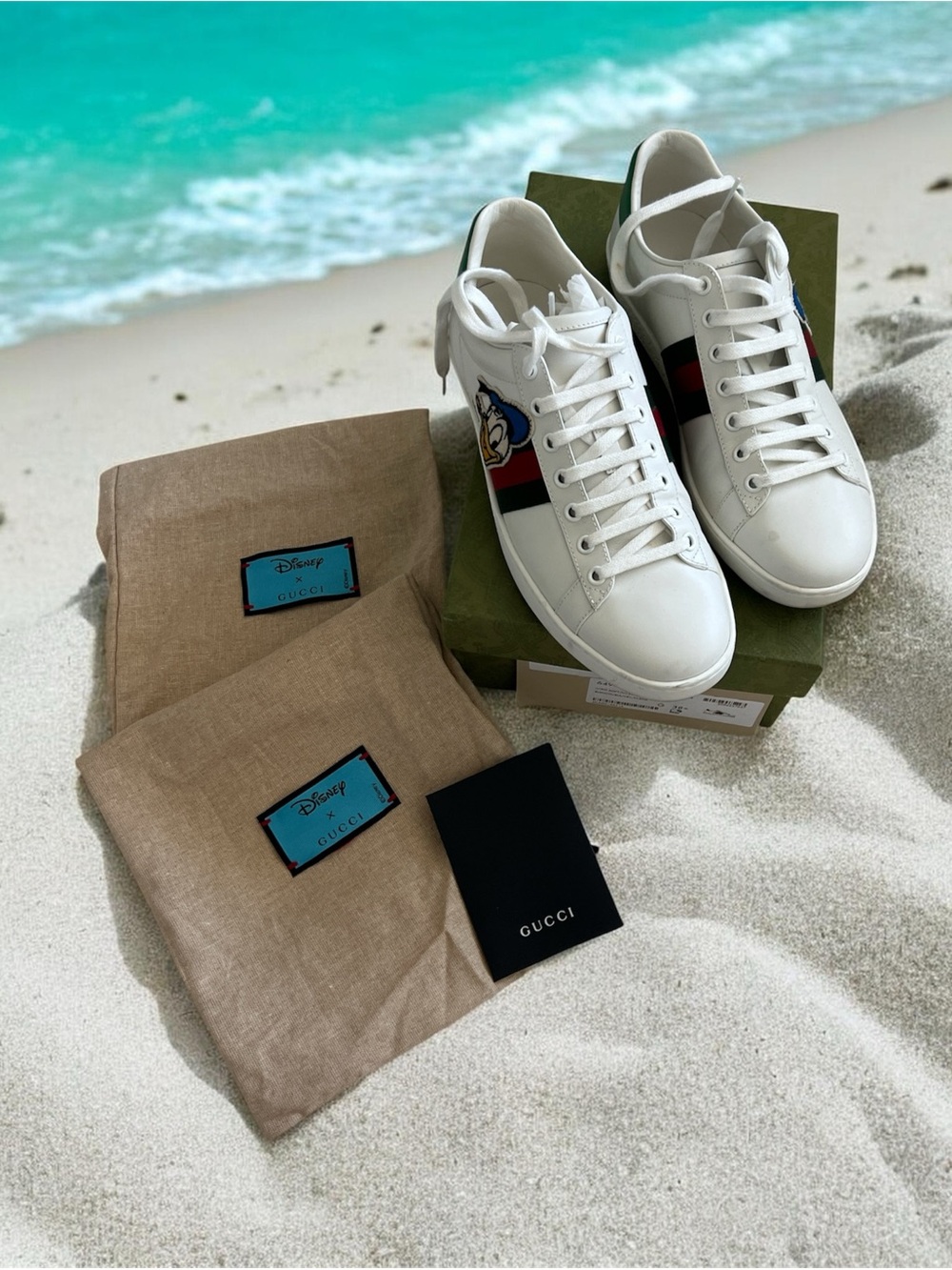 Gucci White Leather Sneakers with Blue & Red Stripe and Cartoon Patch